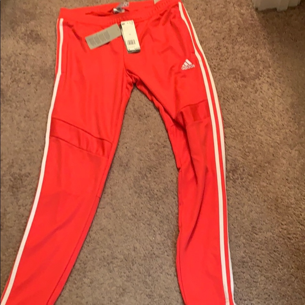 Brand new Adidas tapered fit pants